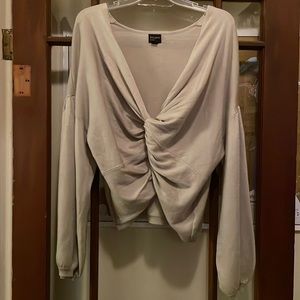 Cream long sleeve crop top with knot detail